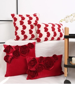 Detail of red 3D rose and heart velvet pillow covers for wedding and living room sofa