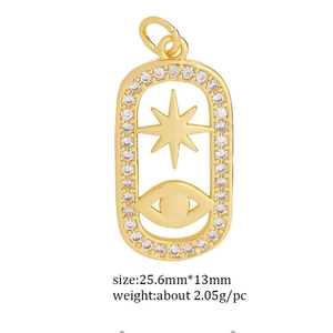 Detailed view of gold star and eye pendant with clear zircon inlay and sizing info