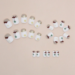 Short matte press-on nails set featuring palm tree and crescent moon sunset designs