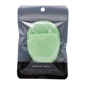 Green heart-shaped cleansing sponge in a professional resealable bag with hanging rope