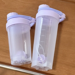 Dual protein shaker bottles with measuring scales and mixing balls in purple finish