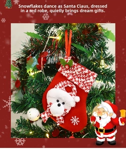 Detail of red plush Christmas stocking featuring a 3D polar bear and plaid scarf hanging