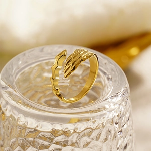 Vintage gold wing titanium steel open ring with adjustable feather design for men and women
