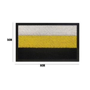 Macro shot of 8x5cm Russian eagle tricolor embroidery patch with precise black border