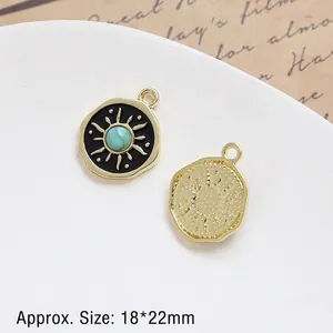 Macro detail of vintage sun pendant with turquoise bead and black enamel, size 18x22mm