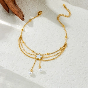 Elegant multi-layer gold stainless steel anklet with white clover and pearl charms