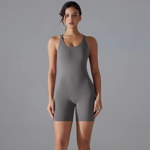 Detail of grey athletic romper showing the seamless fabric texture and U-back design