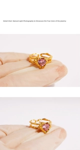 Detail shot of heart pink crystal ring with golden lava texture adjustable band