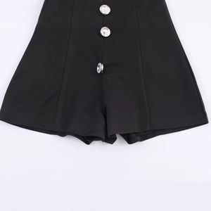 Damen Jumpsuit in Schwarz mit eleganten Strassknöpfen in der flachen Draufsicht
