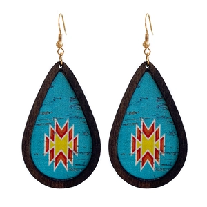 Waterdrop wood earrings with turquoise tribal sun patterns and golden hooks on white background