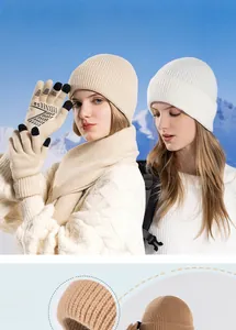 Close-up of knit winter set with thermal beanie, scarf, and touchscreen-ready gloves