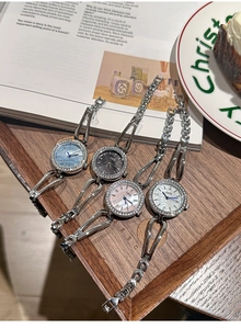 Elegant ladies quartz watches with rhinestone bezel in silver, blue, pink and white dials
