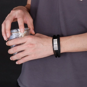 Men's triple-layer braided black leather bracelet with curved stainless steel plate clasp