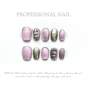 Purple cat eye press-on nails with silver glitter and 3D cartoon bunny charms