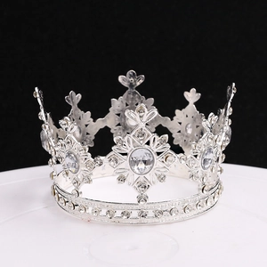 Elegant silver crown cake topper with sparkling crystals for birthday party decorations