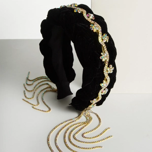 Elegant black velvet braided headband featuring sparkling rhinestone tassels and floral cluster