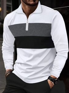 Détail du polo homme color-block avec col zippé et manches longues stylées