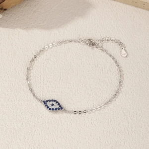 Minimalist S925 sterling silver eye bracelet with blue and clear gemstones charm