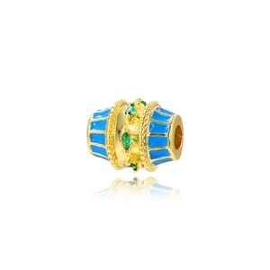 Detail of blue enamel and green zircon cylinder bead for DIY jewelry making