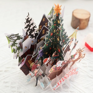 3D pop-up Christmas card featuring a festive tree, reindeer, and Santa Claus scene