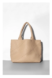 Detail shot of the khaki hand-woven texture and premium soft leather on this tote bag