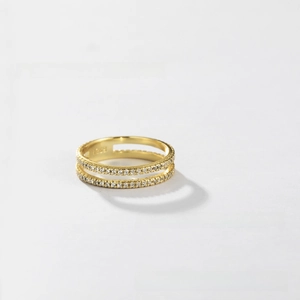 Macro detail of S925 hallmark on gold double layer sparkling crystal studded silver ring