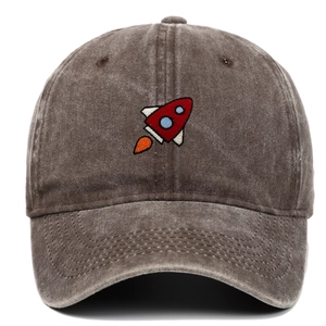 Close-up of rocket embroidery on a vintage washed canvas baseball cap in taupe