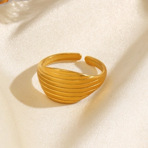 Minimalist 18K gold plated titanium steel open ring featuring linear texture on satin