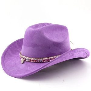Detail of purple faux suede cowboy hat featuring colorful woven band and shell pendant