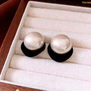 French style pearl and black velvet ball drop earrings in a luxury jewelry box