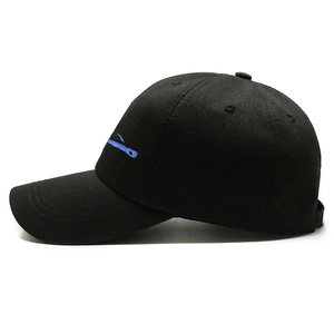 Black cotton baseball cap with blue whale embroidery side view for sun protection