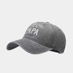 Detail of vintage washed dark gray cotton baseball cap with white Papa text print