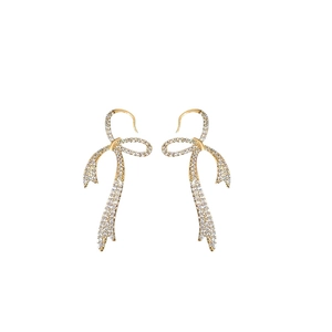 Elegant gold bow earrings with sparkling cubic zirconia tassels on a white background