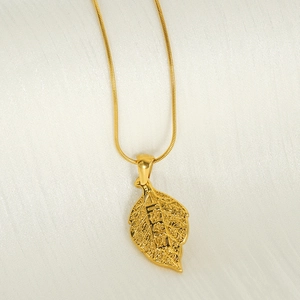 Golden titanium steel necklace with detailed leaf pendant and Chinese wealth engraving