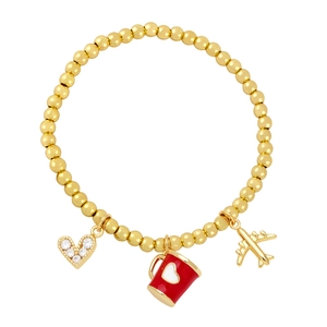 Gold beaded stretch bracelet featuring heart, red coffee cup, and airplane charms