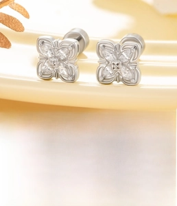 Detail of silver flower ear studs with marquise zircon stones and 0.8x6mm screw back