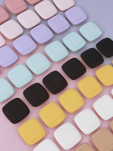 Array of colorful square finger powder puffs for makeup application in various vibrant tones