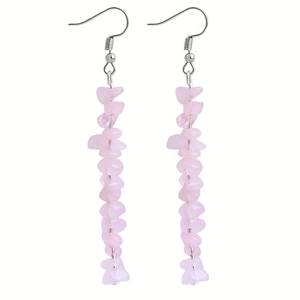 Detail of handmade long drop earrings with natural pink crystal chips and silver hooks
