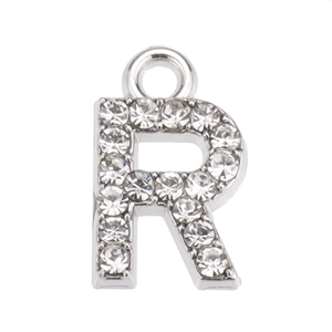 Close-up of silver letter R pendant with sparkling rhinestones and metal loop