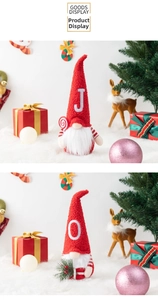 Detail of plush Christmas gnomes featuring J and O letters with festive ornaments