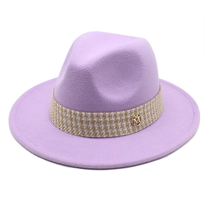 Lavender wool felt fedora featuring a houndstooth ribbon and golden M emblem detail