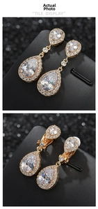 Detail of pear-cut cubic zirconia clip-on earrings in gold with secure back design