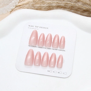 Handmade almond pink cat eye press-on nails set of 10 displayed on a white size card