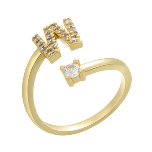 Detail of gold letter W ring with micro-paved zircons and a round clear stone setting