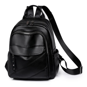 Classic black PU leather backpack with rivet accents and spacious multi-zipper compartments