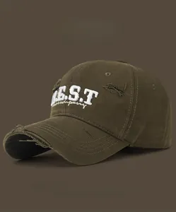 Detailed close-up of distressed olive green baseball cap with white BEST embroidery