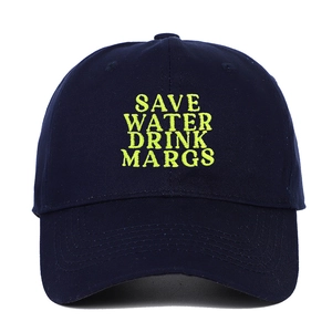 Detail of neon yellow Save Water Drink Margs embroidery on navy blue cotton baseball cap