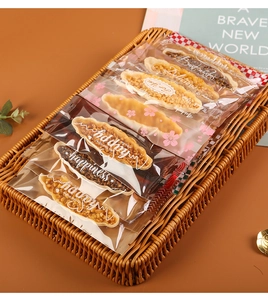 Macro detail of individually wrapped snacks in transparent sealed bags inside a basket