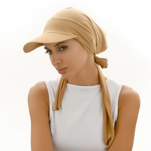 Detail showing the khaki sunshade headscarf with built-in brim and adjustable straps