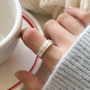 Minimalist S925 sterling silver multi-layered irregular ring for women on model hand